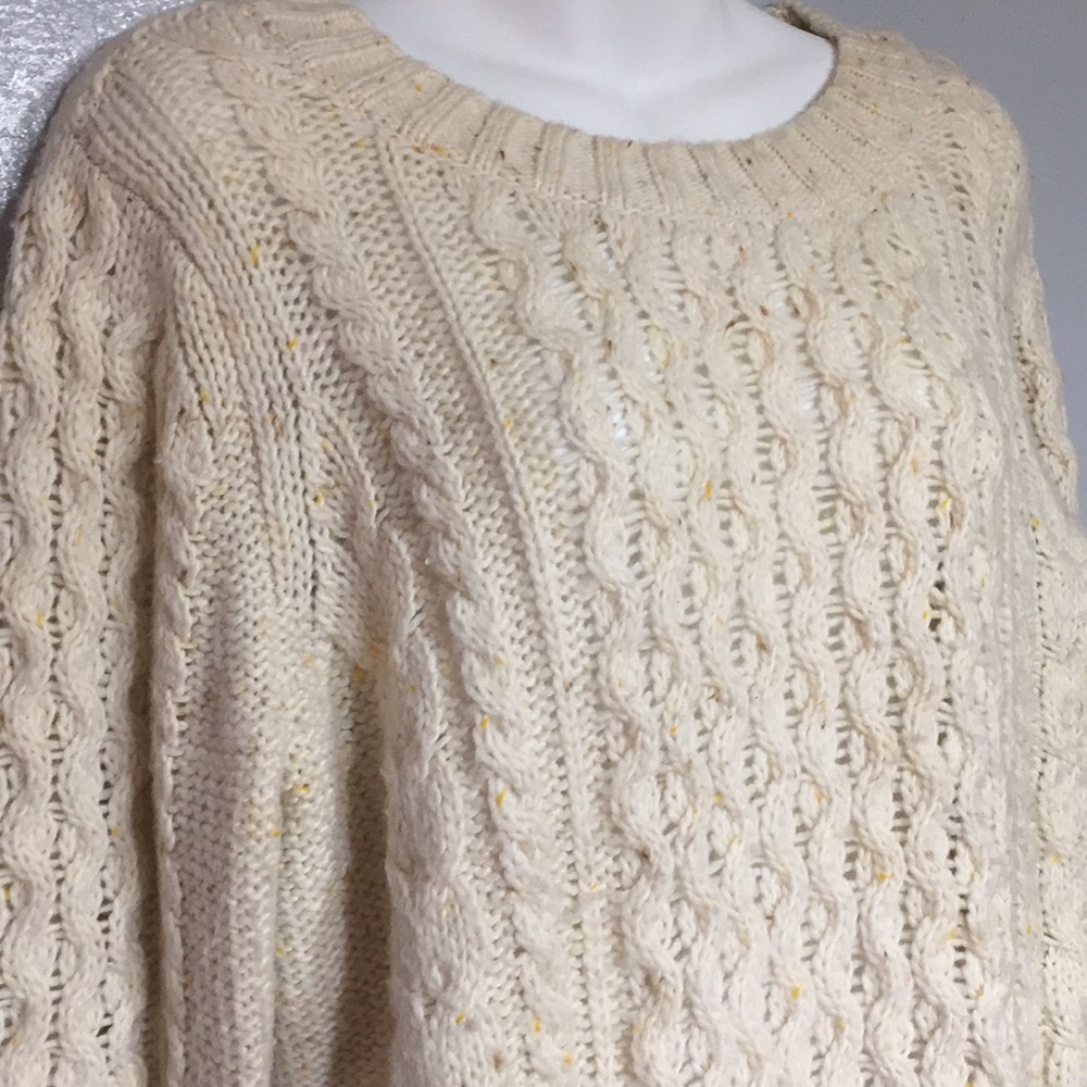 Beautiful cream colored cable knit sweater